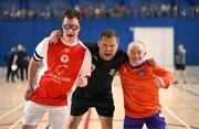 11 May 2025; Referee David Gallagher with St Patrick's Athletic captain Mark O'Meara and Wexford captain Alan Sutherland during the LOI Cairdeas Cup Festival match between / and / at the National Indoor Arena on the Sport Ireland Campus in Dublin. Photo by Stephen McCarthy/Sportsfile