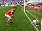 11 May 2025; Dermot Campbell of Louth jovially throws the Delaney Cup over the Canal End goal line after the Leinster GAA Football Senior Championship final match between Louth and Meath at Croke Park in Dublin. Photo by Piaras Ó Mídheach/Sportsfile