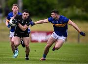 11 May 2025; Nathan Mullen of Sligo is tackled by Kieran Costello of Tipperary during the Táilteann Cup match between Sligo and Tipperary at Kilcoyne Memorial Park in Tubbercurry, Sligo. Photo by Ray McManus/Sportsfile