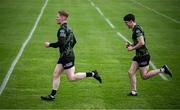 11 May 2025; Injured Sligo players Luke Casserly, left, and Eoghan Smith run lengths before the Táilteann Cup match between Sligo and Tipperary at Kilcoyne Memorial Park in Tubbercurry, Sligo. Photo by Ray McManus/Sportsfile