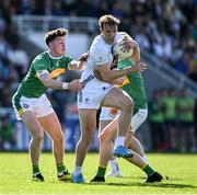 10 May 2025; Darragh Kirwan of Kildare in action against Mark Diffley, left, and Keith Keegan of Leitrim during the Táilteann Cup Round 1 match between Kildare and Leitrim at Cedral St Conleth's Park in Newbridge, Kildare. Photo by Daire Brennan/Sportsfile