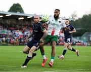 9 May 2025; Djenairo Daniels of Cork City in action against Mark Connolly of Derry City during the SSE Airtricity Men's Premier Division match between Cork City and Derry City at Turner's Cross in Cork. Photo by Michael P Ryan/Sportsfile