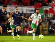 9 May 2025; Greg Bolger of Cork City in action against Robbie Benson of Derry City during the SSE Airtricity Men's Premier Division match between Cork City and Derry City at Turner's Cross in Cork. Photo by Michael P Ryan/Sportsfile