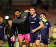 9 May 2025; Derry City players, from left, Arlo Doherty and Hayden Cann after their side's victory in the SSE Airtricity Men's Premier Division match between Cork City and Derry City at Turner's Cross in Cork. Photo by Michael P Ryan/Sportsfile