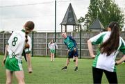 12 May 2025; Olympian Thomas Barr with students from St Laurence's Catholic National School during the Dare to Believe Olympic Schools Programme at St Laurence's Catholic National School in Kildare. Photo by David Fitzgerald/Sportsfile