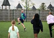 12 May 2025; Olympian Thomas Barr with students from St Laurence's Catholic National School during the Dare to Believe Olympic Schools Programme at St Laurence's Catholic National School in Kildare. Photo by David Fitzgerald/Sportsfile