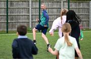 12 May 2025; Olympian Thomas Barr with students from St Laurence's Catholic National School during the Dare to Believe Olympic Schools Programme at St Laurence's Catholic National School in Kildare. Photo by David Fitzgerald/Sportsfile