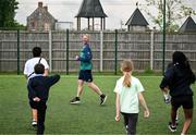 12 May 2025; Olympian Thomas Barr with students from St Laurence's Catholic National School during the Dare to Believe Olympic Schools Programme at St Laurence's Catholic National School in Kildare. Photo by David Fitzgerald/Sportsfile