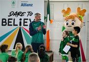 12 May 2025; Olympian Thomas Barr with students from St Laurence's Catholic National School during the Dare to Believe Olympic Schools Programme at St Laurence's Catholic National School in Kildare. Photo by David Fitzgerald/Sportsfile