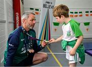 12 May 2025; Olympian Thomas Barr with students from St Laurence's Catholic National School during the Dare to Believe Olympic Schools Programme at St Laurence's Catholic National School in Kildare. Photo by David Fitzgerald/Sportsfile