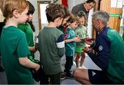 12 May 2025; Olympian Thomas Barr with students from St Laurence's Catholic National School during the Dare to Believe Olympic Schools Programme at St Laurence's Catholic National School in Kildare. Photo by David Fitzgerald/Sportsfile