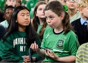 12 May 2025; Students from St Laurence's Catholic National School look at Olympian Thomas Barr's medals during the Dare to Believe Olympic Schools Programme at St Laurence's Catholic National School in Kildare. Photo by David Fitzgerald/Sportsfile