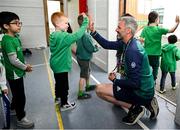 12 May 2025; Olympian Thomas Barr with students from St Laurence's Catholic National School during the Dare to Believe Olympic Schools Programme at St Laurence's Catholic National School in Kildare. Photo by David Fitzgerald/Sportsfile