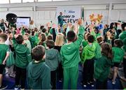 12 May 2025; Olympian Thomas Barr with students from St Laurence's Catholic National School during the Dare to Believe Olympic Schools Programme at St Laurence's Catholic National School in Kildare. Photo by David Fitzgerald/Sportsfile