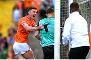 10 May 2025; Ross McQuillan of Armagh taunts Donegal goalkeeper Shaun Patton during the Ulster GAA Football Senior Championship final match between Armagh and Donegal at St Tiernach's Park in Clones, Monaghan. Photo by Ramsey Cardy/Sportsfile