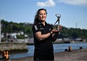 13 May 2025; PwC GPA Player of the Month for April in camogie, Mairéad Teehan of Offaly, with her award outside the PwC offices in Cork. Photo by David Fitzgerald/Sportsfile