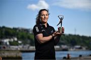 13 May 2025; PwC GPA Player of the Month for April in camogie, Mairéad Teehan of Offaly, with her award outside the PwC offices in Cork. Photo by David Fitzgerald/Sportsfile