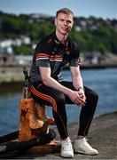 13 May 2025; PwC GAA/GPA Player of the Month for April in football, Mathew Costello of Meath, with his award outside the PwC offices in Cork. Photo by David Fitzgerald/Sportsfile