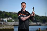 13 May 2025; PwC GAA/GPA Player of the Month for April in football, Mathew Costello of Meath, with his award outside the PwC offices in Cork. Photo by David Fitzgerald/Sportsfile