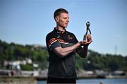 13 May 2025; PwC GAA/GPA Player of the Month for April in football, Mathew Costello of Meath, with his award outside the PwC offices in Cork. Photo by David Fitzgerald/Sportsfile