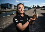 13 May 2025; PwC GPA Player of the Month for April in camogie, Mairéad Teehan of Offaly, with her award outside the PwC offices in Cork Photo by David Fitzgerald/Sportsfile