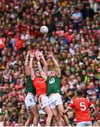 11 May 2025; Meath players Bryan Menton, left, and Jack Flynn contest possession against Tommy Durnin of Louth during the Leinster GAA Football Senior Championship final match between Louth and Meath at Croke Park in Dublin. Photo by Piaras Ó Mídheach/Sportsfile