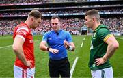 11 May 2025; Referee Martin McNally with team captains Sam Mulroy of Louth and Eoghan Frayne of Meath before the Leinster GAA Football Senior Championship final match between Louth and Meath at Croke Park in Dublin. Photo by Piaras Ó Mídheach/Sportsfile