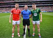 11 May 2025; Referee Martin McNally with team captains Sam Mulroy of Louth and Eoghan Frayne of Meath before the Leinster GAA Football Senior Championship final match between Louth and Meath at Croke Park in Dublin. Photo by Piaras Ó Mídheach/Sportsfile