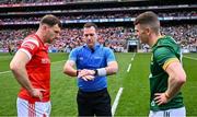 11 May 2025; Referee Martin McNally with team captains Sam Mulroy of Louth and Eoghan Frayne of Meath before the Leinster GAA Football Senior Championship final match between Louth and Meath at Croke Park in Dublin. Photo by Piaras Ó Mídheach/Sportsfile