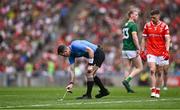 11 May 2025; Referee Martin McNally using vanishing spray to mark the position of a free during the Leinster GAA Football Senior Championship final match between Louth and Meath at Croke Park in Dublin. Photo by Piaras Ó Mídheach/Sportsfile