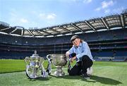 14 May 2025; Allianz today announced the extension of its sponsorship of the GAA Football All-Ireland Senior Championship for a further three years and unveiled the newest face of its 2025 campaign, 9-year-old Sheamie Garrihy, who will assume the role of Allianz’s first ‘Stop the Drop’ Reporter. Sheamie will take on a unique role, interviewing players, coaches, parents, teachers and sporting personalities from across the world of Gaelic Games to find out what sport means to them, what inspired them to keep going and how adults today can help children stay engaged in sport. Pictured at Croke Park in Dublin is Allianz first 'Stop the Drop' reporter, nine year old Sheamie Garrihy from Clare with the Tailteann cup and the Sam Magure cup. Photo by Brendan Moran/Sportsfile
