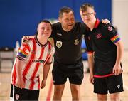 11 May 2025; Referee David Gallagher with the team captains before the LOI Cairdeas Cup Festival match between Derry City and Drogheda United at the National Indoor Arena on the Sport Ireland Campus in Dublin. Photo by Stephen McCarthy/Sportsfile