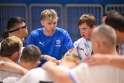 11 May 2025; Waterford players and coaches huddle before the LOI Cairdeas Cup Festival match between Waterford and St Patrick's Athletic at the National Indoor Arena on the Sport Ireland Campus in Dublin. Photo by Stephen McCarthy/Sportsfile