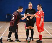 11 May 2025; Referee Sarah Dyas with Bohemians captain Paul Mullen and Shelbourne captain Josh Hennessy before the LOI Cairdeas Cup Festival match between Bohemians and Shelbourne at the National Indoor Arena on the Sport Ireland Campus in Dublin. Photo by Stephen McCarthy/Sportsfile