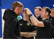 11 May 2025; League of Ireland director Mark Scanlon presents Dundalk coach Enda Minogue with a winners medal after the LOI Cairdeas Cup Festival final match between Dundalk and Finn Harps at the National Indoor Arena on the Sport Ireland Campus in Dublin. Photo by Stephen McCarthy/Sportsfile
