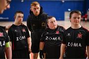 11 May 2025; Dundalk coach Enda Minogue listens to the pre-match team talk before the LOI Cairdeas Cup Festival final match between Dundalk and Finn Harps at the National Indoor Arena on the Sport Ireland Campus in Dublin. Photo by Stephen McCarthy/Sportsfile