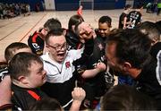 11 May 2025; Dundalk players and coaches celebrate after the LOI Cairdeas Cup Festival final match between Dundalk and Finn Harps at the National Indoor Arena on the Sport Ireland Campus in Dublin. Photo by Stephen McCarthy/Sportsfile