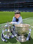 14 May 2025; Allianz today announced the extension of its sponsorship of the GAA Football All-Ireland Senior Championship for a further three years and unveiled the newest face of its 2025 campaign, 9-year-old Sheamie Garrihy, who will assume the role of Allianz’s first ‘Stop the Drop’ Reporter. Sheamie will take on a unique role, interviewing players, coaches, parents, teachers and sporting personalities from across the world of Gaelic Games to find out what sport means to them, what inspired them to keep going and how adults today can help children stay engaged in sport. Pictured at Croke Park in Dublin is Allianz first 'Stop the Drop' reporter, nine year old Sheamie Garrihy from Clare with the Tailteann cup and the Sam Magure cup. Photo by Brendan Moran/Sportsfile