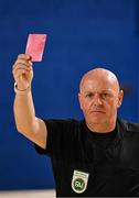11 May 2025; Referee James Keating shows a red card during the LOI Cairdeas Cup Festival match between Dundalk and Sligo Rovers at the National Indoor Arena on the Sport Ireland Campus in Dublin. Photo by Stephen McCarthy/Sportsfile