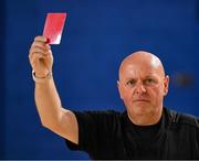 11 May 2025; Referee James Keating shows a red card during the LOI Cairdeas Cup Festival match between Dundalk and Sligo Rovers at the National Indoor Arena on the Sport Ireland Campus in Dublin. Photo by Stephen McCarthy/Sportsfile