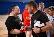 11 May 2025; Waterford goalkeeper Josh Keating and referee David Gallagher after the LOI Cairdeas Cup Festival match between Derry City and Waterford at the National Indoor Arena on the Sport Ireland Campus in Dublin. Photo by Stephen McCarthy/Sportsfile