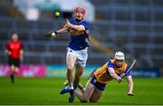 14 May 2025; Cathal English of Tipperary in action against Eoin McMahon of Clare during the oneills.com Munster GAA Hurling U20 Championship final match between Tipperary and Clare at TUS Gaelic Grounds in Limerick. Photo by Tyler Miller/Sportsfile