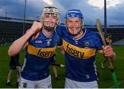 14 May 2025; Tipperary players, from left, Adam Ryan and Aaron O'Halloran celebrates after winning the oneills.com Munster GAA Hurling U20 Championship final match between Tipperary and Clare at TUS Gaelic Grounds in Limerick. Photo by John Sheridan/Sportsfile