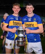 14 May 2025; Tipperary players, from left, Paddy McCormack and Cathal English celebrate with the cup after the oneills.com Munster GAA Hurling U20 Championship final match between Tipperary and Clare at TUS Gaelic Grounds in Limerick. Photo by John Sheridan/Sportsfile