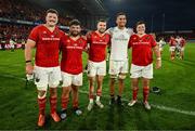 9 May 2025; Cormac Izuchukwu of Ulster with Munster players, from left, Fineen Wycherley, Michael Milne, Diarmuid Kilgallen and Josh Wycherley after the United Rugby Championship match between Munster and Ulster at Thomond Park in Limerick. Photo by Brendan Moran/Sportsfile