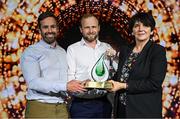 15 May 2025; UCD American Football Team members Eoin Feely, left, Darragh Farrell, are presented with the Elite Team of the Year Award by University College Dublin president Professor Orla Feely during the UCD Athletic Union Council Sports Awards 2025 at Astra Hall in UCD, Dublin. Photo by Seb Daly/Sportsfile