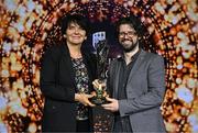 15 May 2025; Ciarán Brennan from UCD Taekwan-do is presented with the Volunteer Coach of the Year award by University College Dublin president Professor Orla Feely during the UCD Athletic Union Council Sports Awards 2025 at Astra Hall in UCD, Dublin. Photo by Seb Daly/Sportsfile