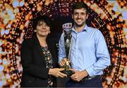 15 May 2025; David Somers from the UCD Boat Clubs is presented with the Graduate of the Year award by University College Dublin president Professor Orla Feely during the UCD Athletic Union Council Sports Awards 2025 at Astra Hall in UCD, Dublin. Photo by Seb Daly/Sportsfile