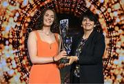 15 May 2025; The UCD Trampoline Club captain Kate Lynch is presented with the Club Inclusion award by University College Dublin president Professor Orla Feely during the UCD Athletic Union Council Sports Awards 2025 at Astra Hall in UCD, Dublin. Photo by Seb Daly/Sportsfile
