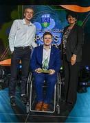 15 May 2025; UCD Men’s Basketball Varsity 1st Team captain Thomas Reynold, left, and coach Adam Drummond are presented with the Varsity Team of the Year award by University College Dublin president Professor Orla Feely during the UCD Athletic Union Council Sports Awards 2025 at Astra Hall in UCD, Dublin. Photo by Seb Daly/Sportsfile